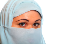 young-muslim-woman-with-hide-face-studio-portrait-on-white-background